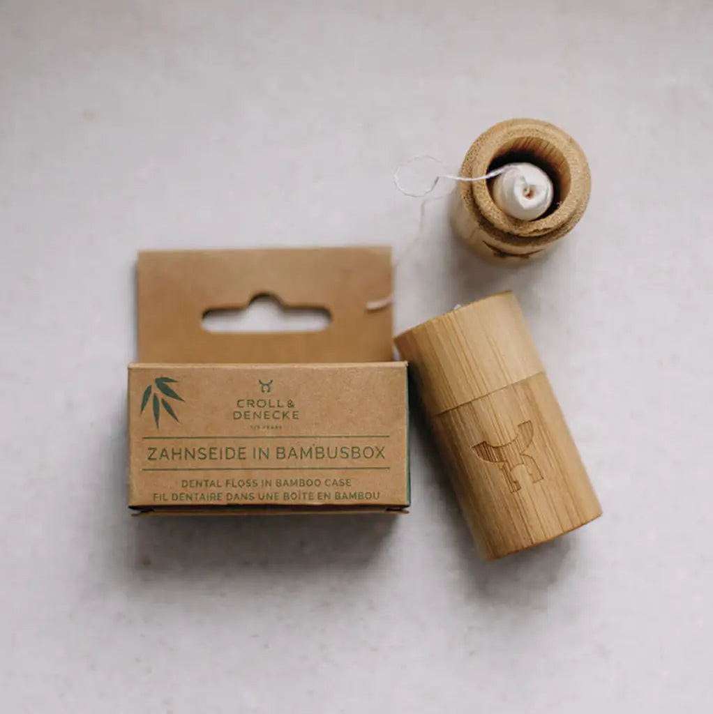 Fio dentário em caixa de bambu